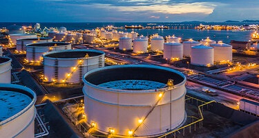 Industrial fuel storage tanks at a logistics facility
